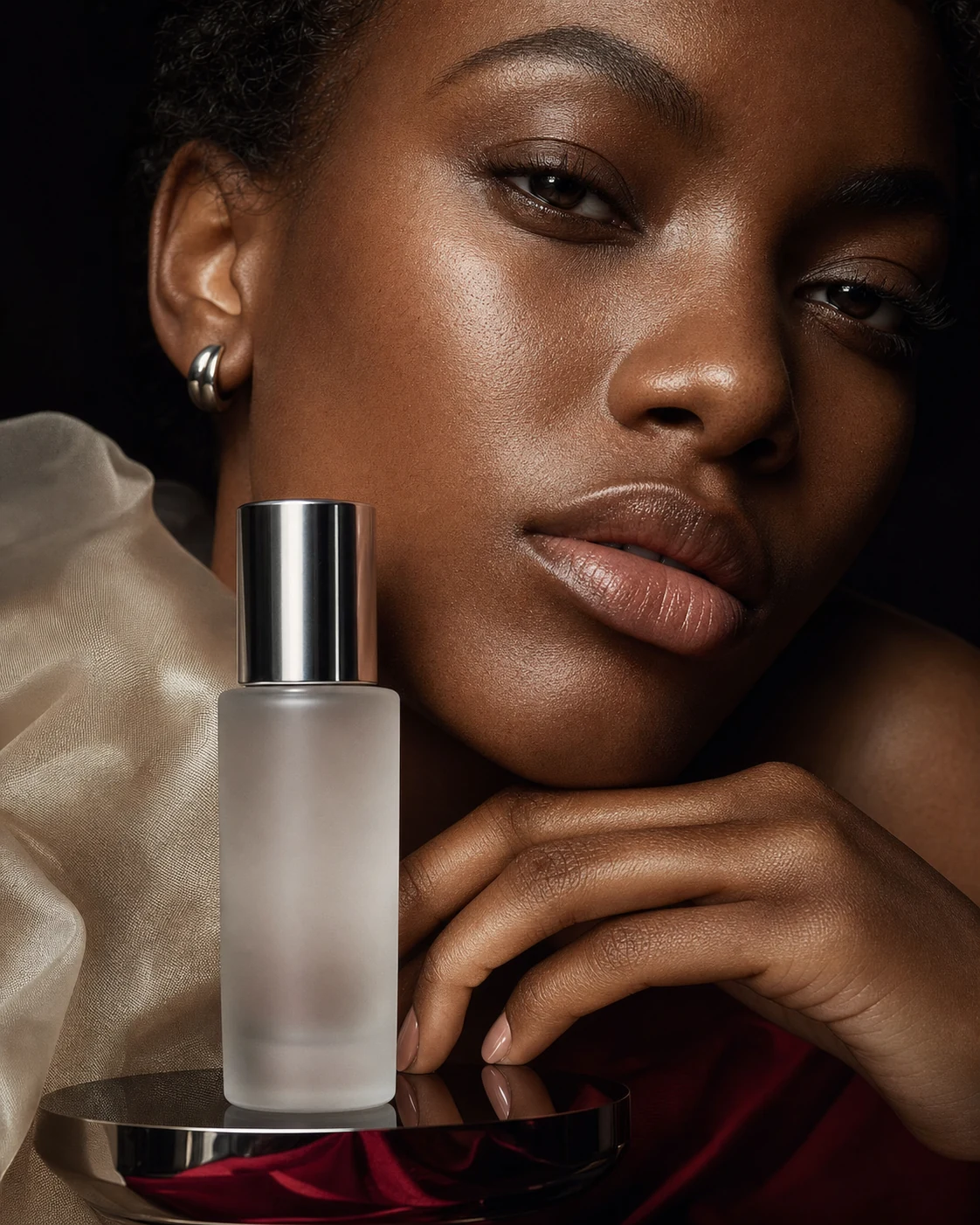 Beauty portrait with an unbranded perfume bottle